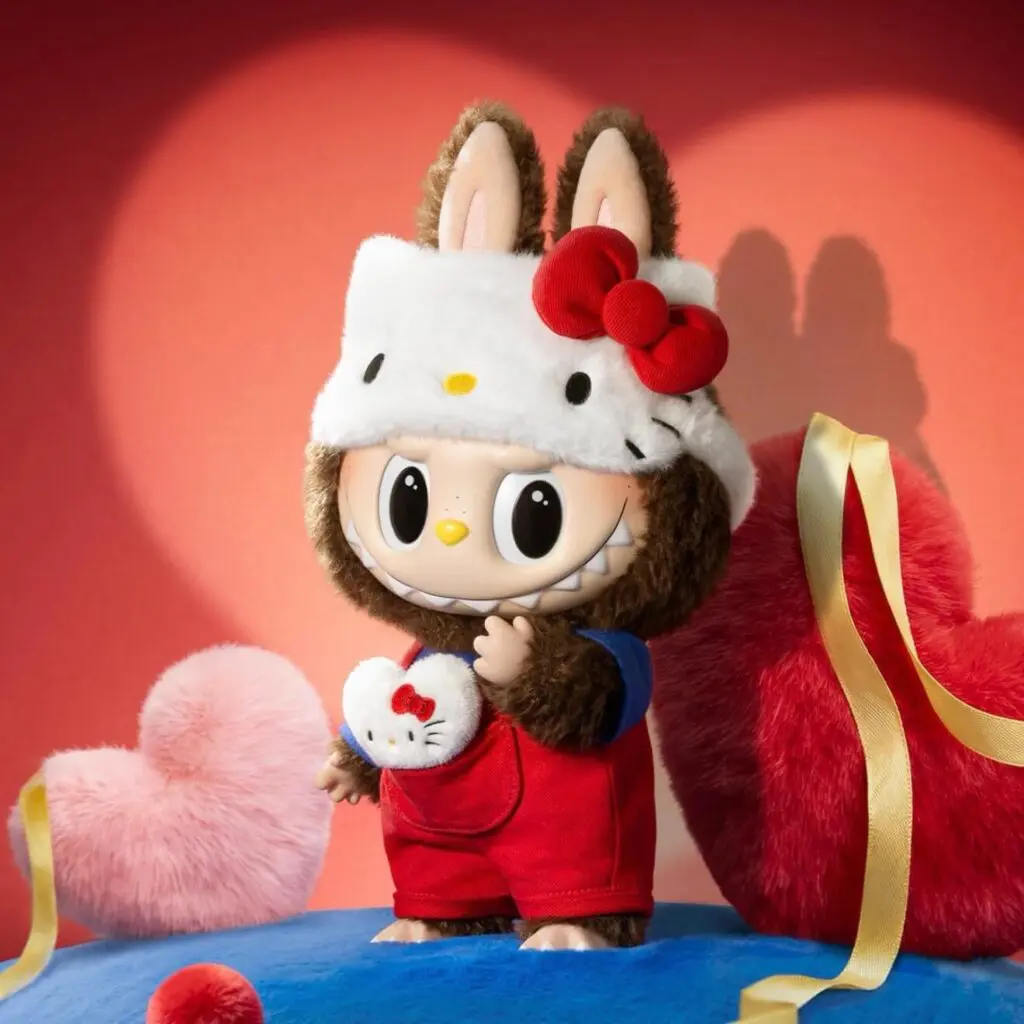Front view of Labubu Hello Kitty plush doll standing in red background
