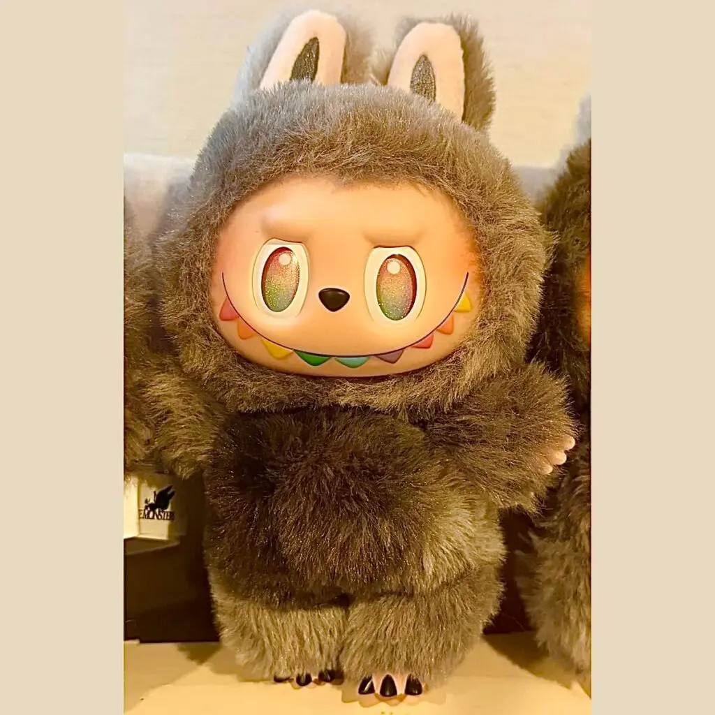 Labubu secret ID keychain doll from Big Into Energy series generation 1 standing in the middle