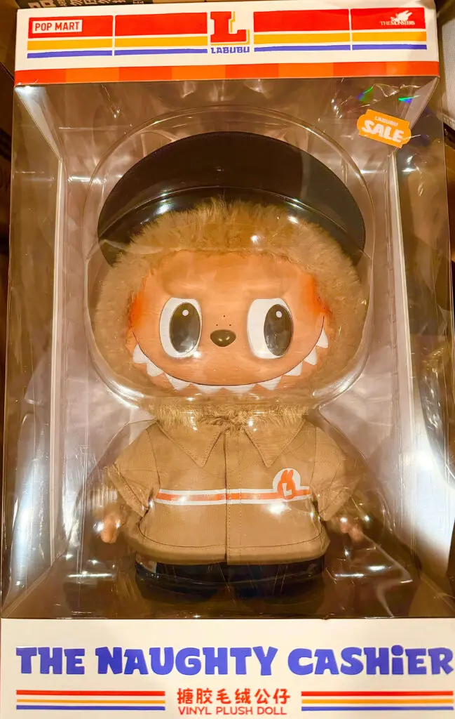 rectangular crop of Labubu The Naughty Cashier plush doll in original box packaging