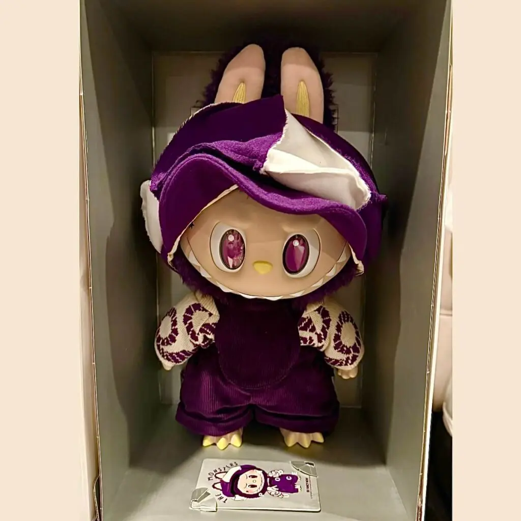 Labubu x Pronounce Be Fancy Now plush doll inside its box packaging