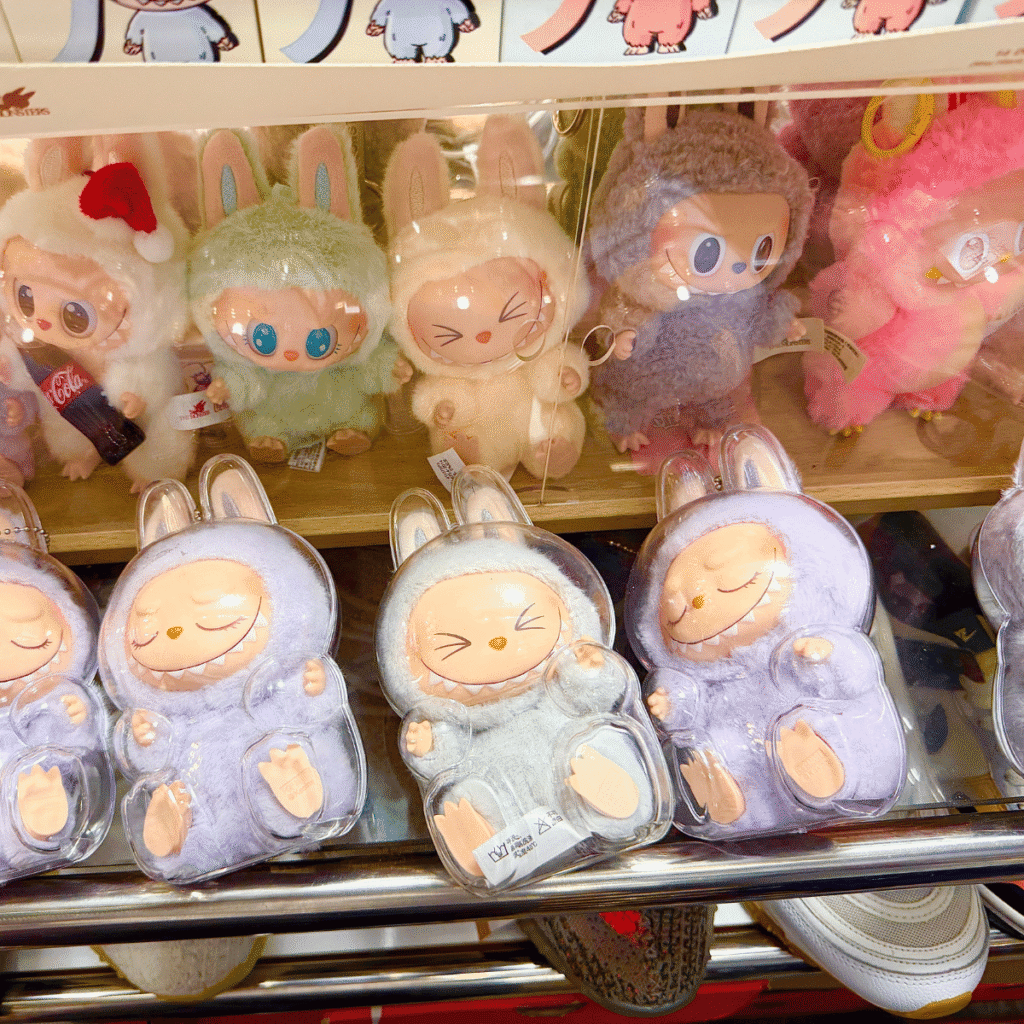 17 cm keychain doll lafufus inside acrylic display cases on a store