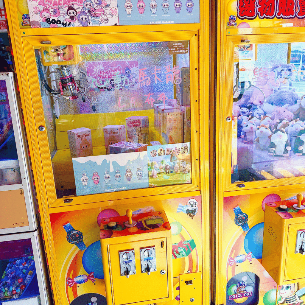 lafufu blind boxes inside a yellow claw machine