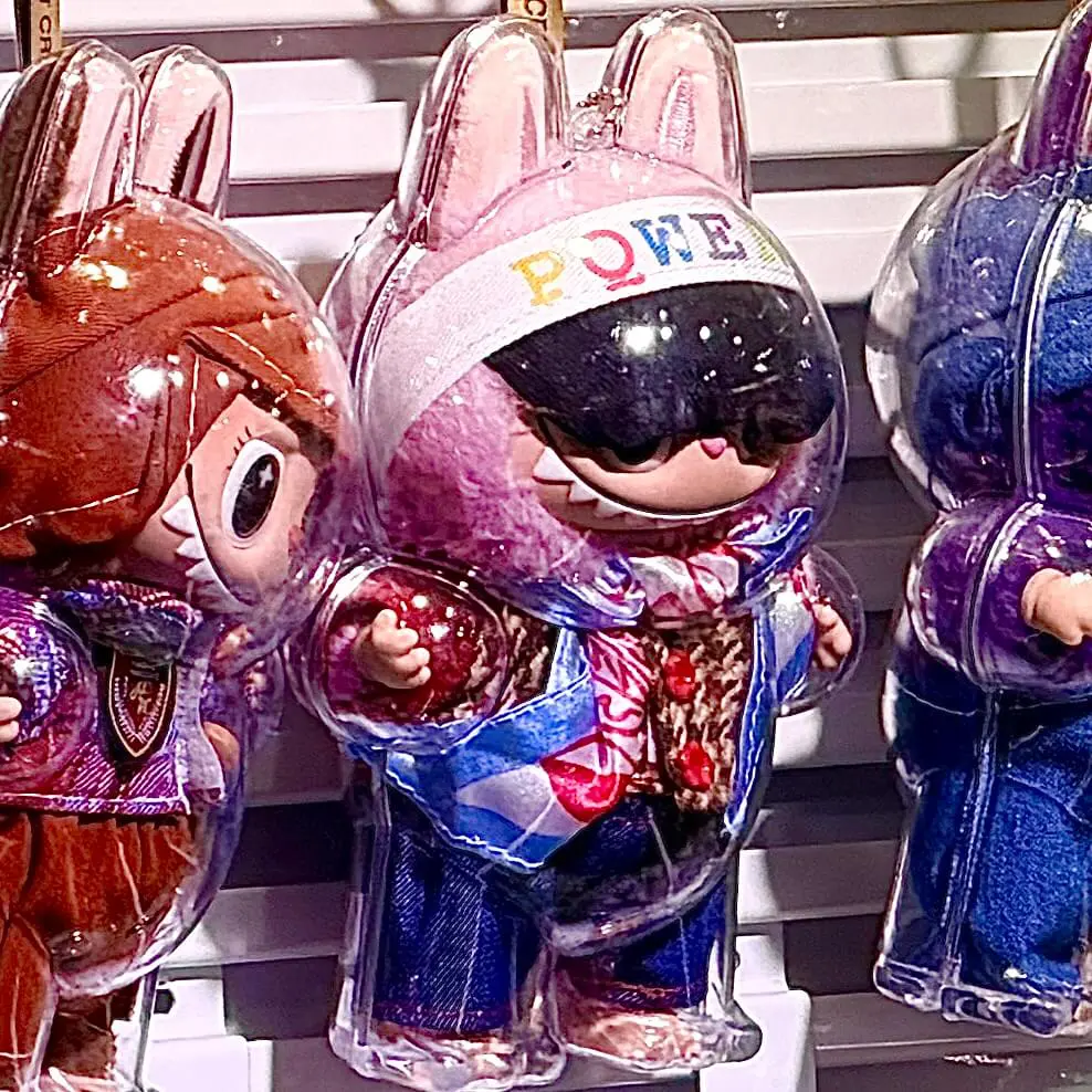 lafufu lychee berry keychain doll hanging on a store display