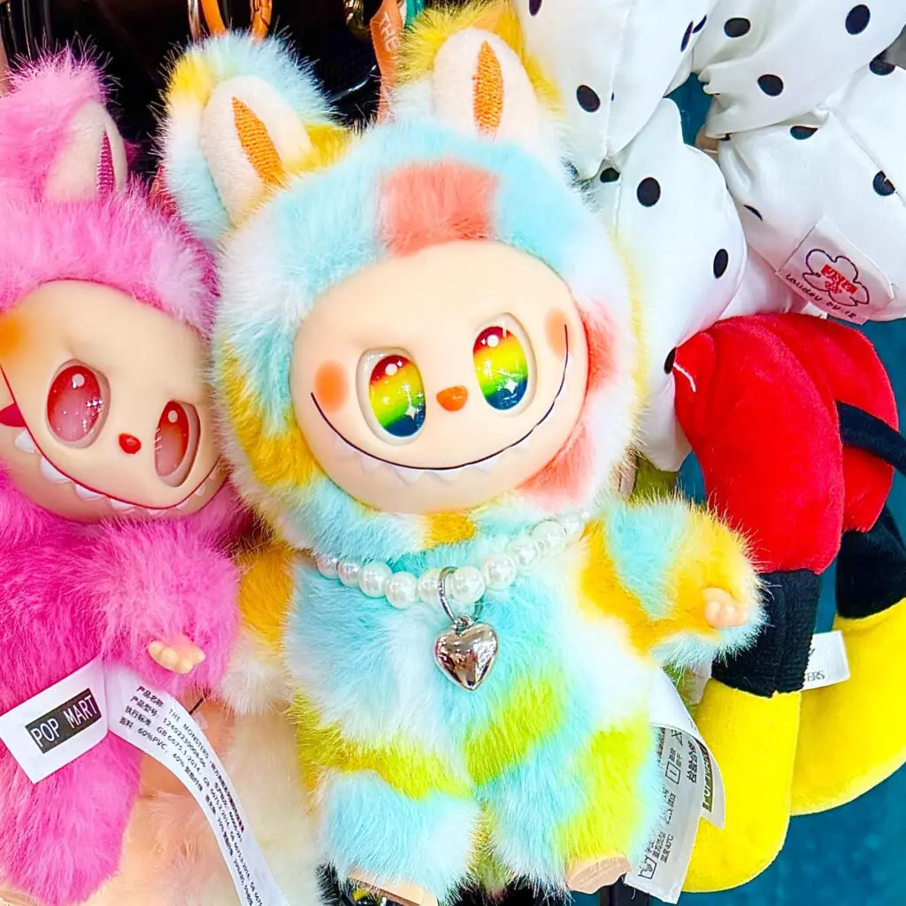 lafufu rock the universe keychain doll hanging on a store display