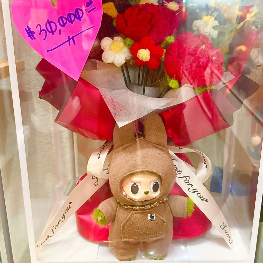 Sacai x Seventeen x Labubu dolls auctioned by Pharrell Williams currently on sale at a store in Los Angeles