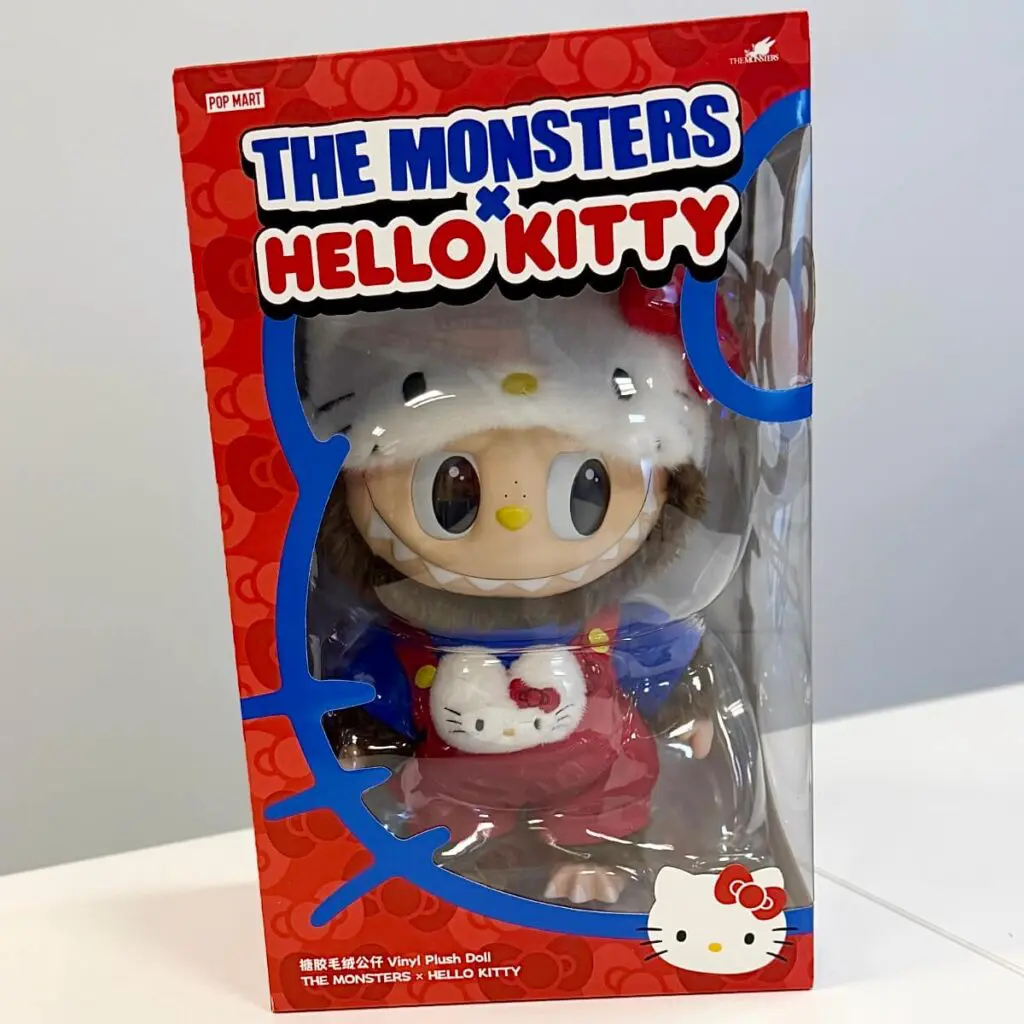 Labubu x Hello Kitty plush doll pop card in its original box packaging