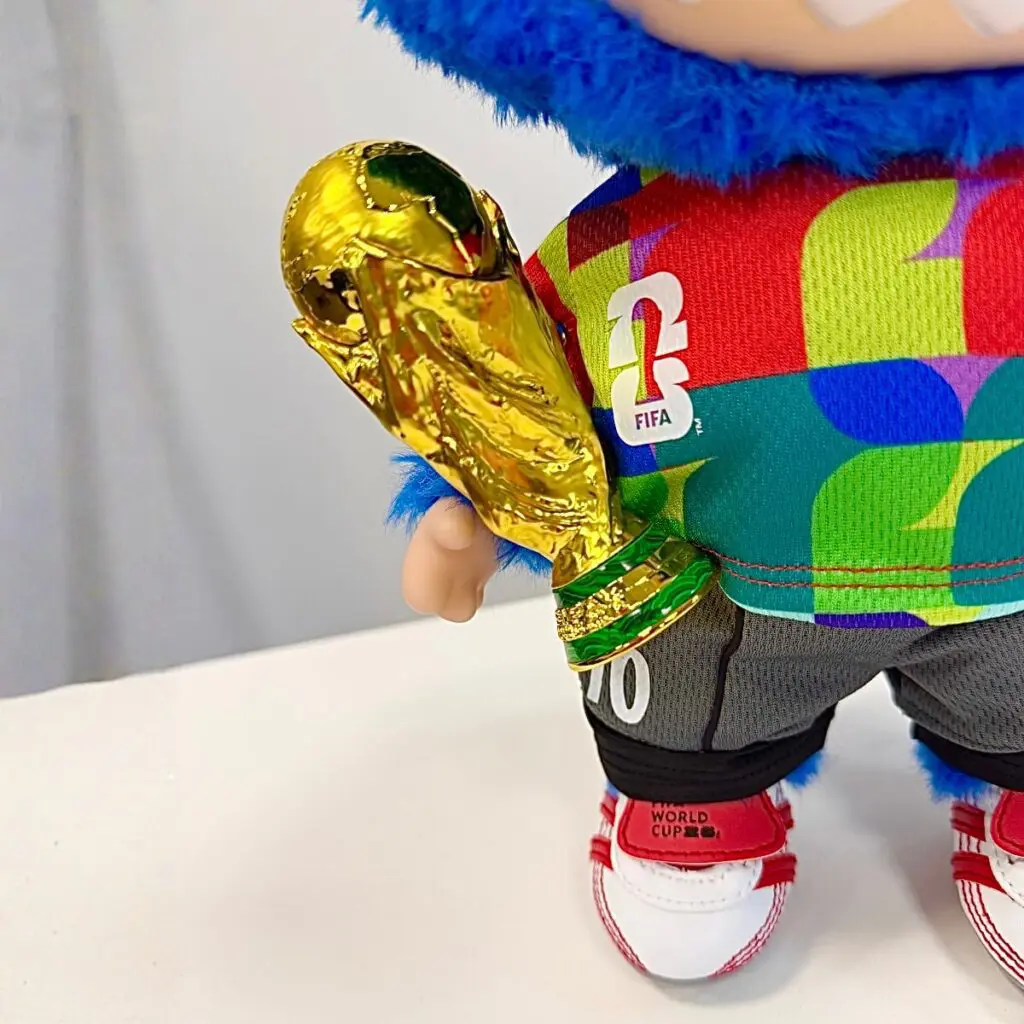 Close up of The Monsters x FIFAWorld Cup Catch the Win plush doll trophy