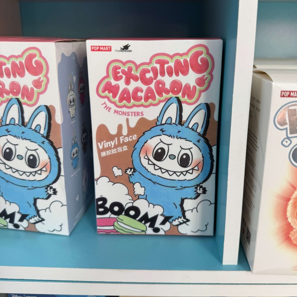 Examples of fake Labubu Exciting Macaron box on shelf at local gift shop