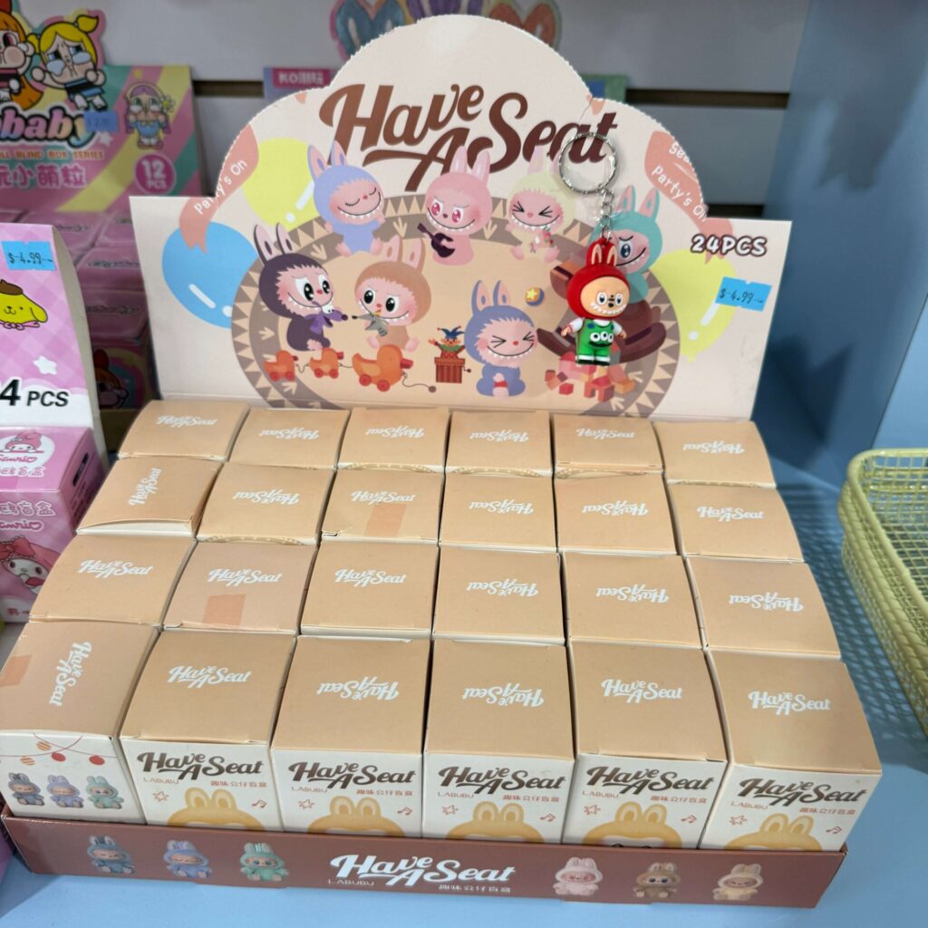 Boxes of the fake Labubu Have a Seat dolls inside nice boxes that look real for sale at a gift shop