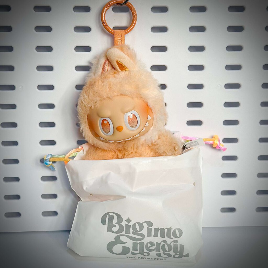 labubu big into energy happiness inside pouch