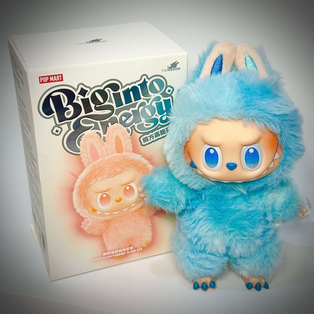 labubu big into energy hope beside box