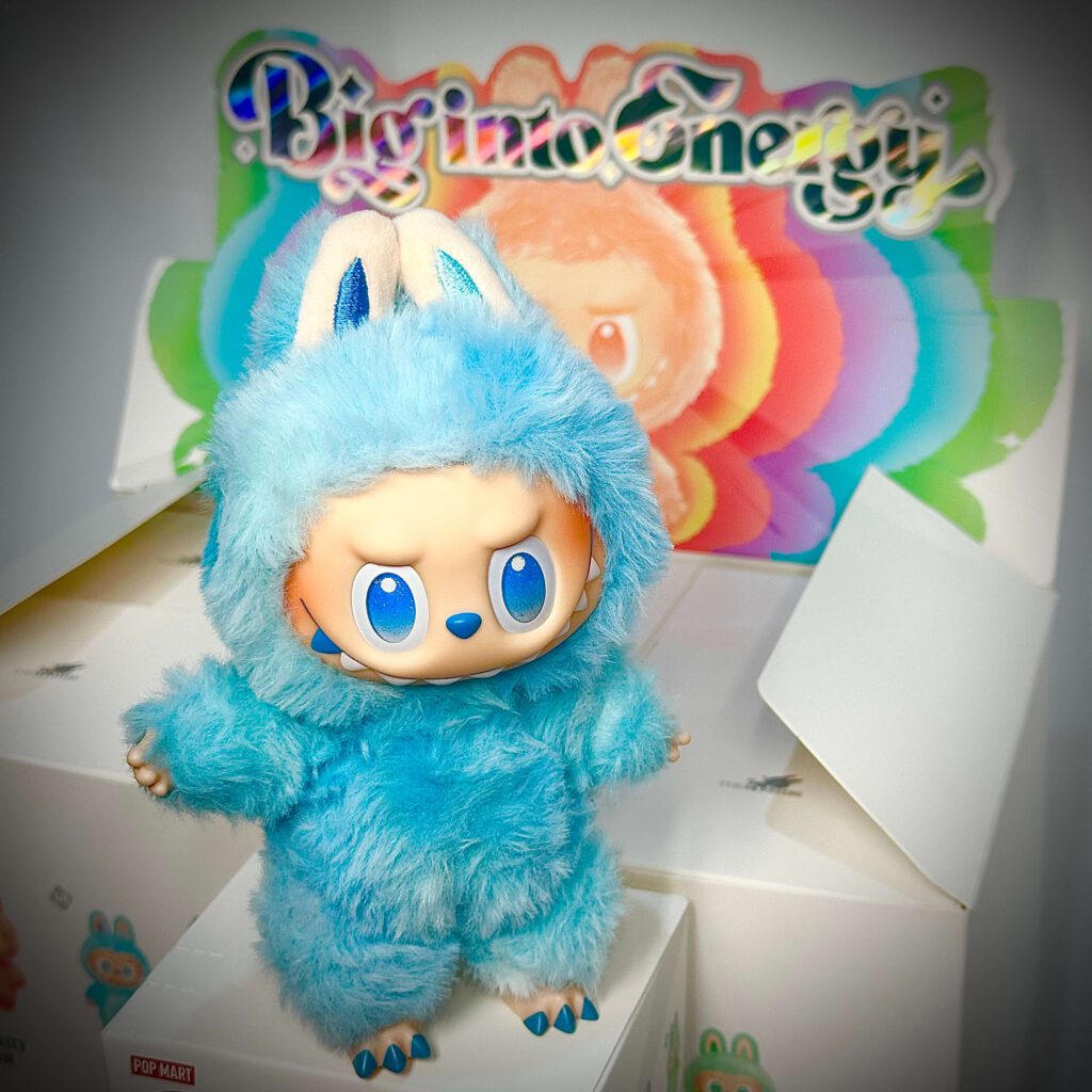 labubu big into energy hope boxes backdrop