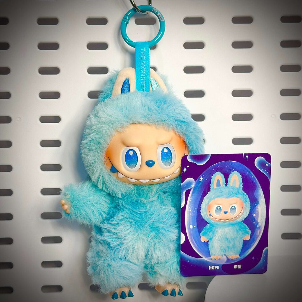 labubu big into energy hope hung with name card