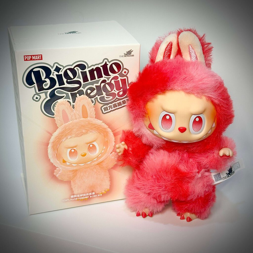labubu big into energy love beside box