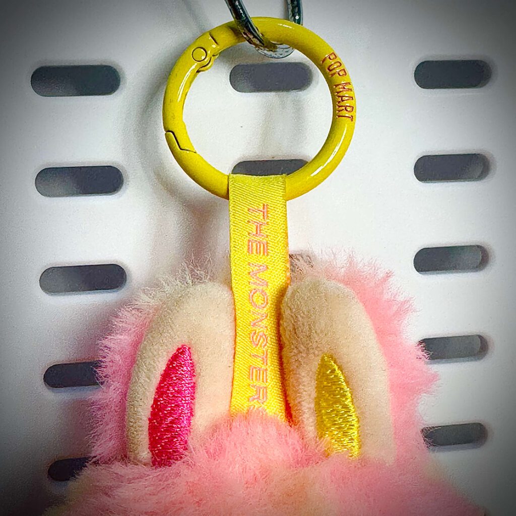 labubu big into energy loyalty lanyard front