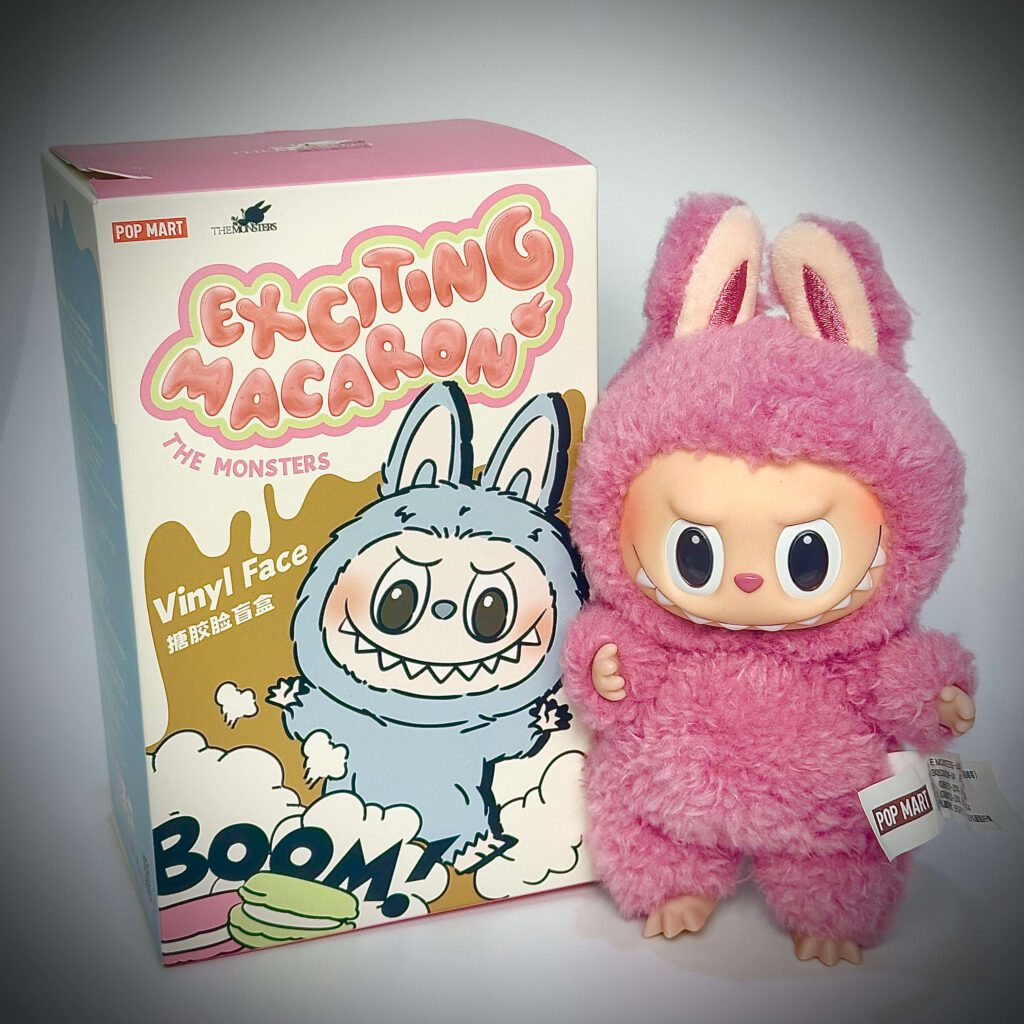 labubu exciting macaron lychee berry beside box