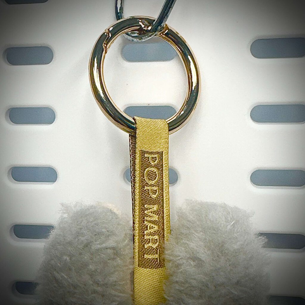 labubu exciting macaron sesame bean lanyard back