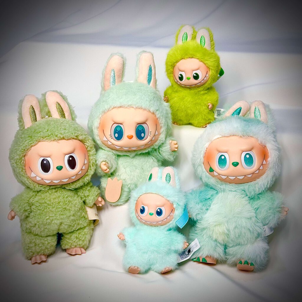 group portrait of green labubu