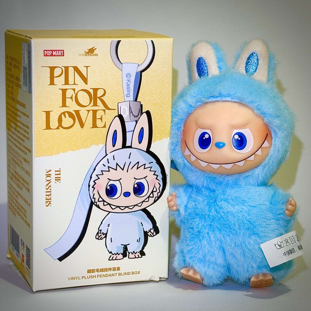 mini labubu pin for love K beside box