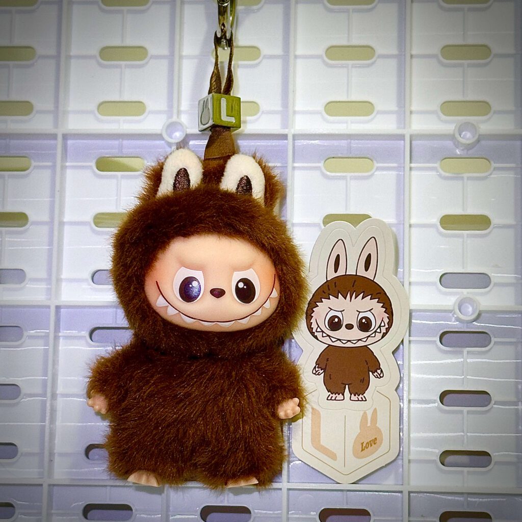 mini labubu pin for love L hung with sticker name