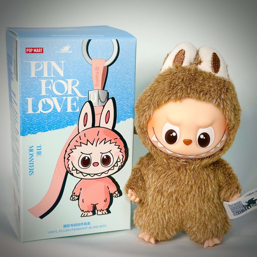 mini labubu pin for love & beside box