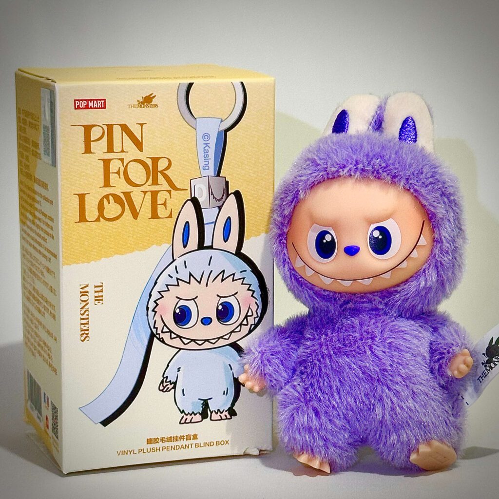 mini labubu pin for love beside box