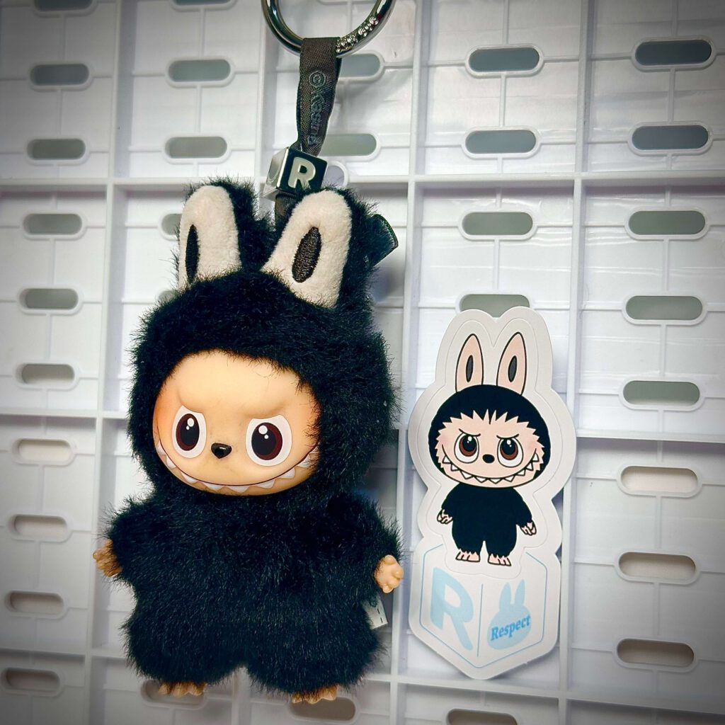 mini labubu pin for love r hung with sticker name
