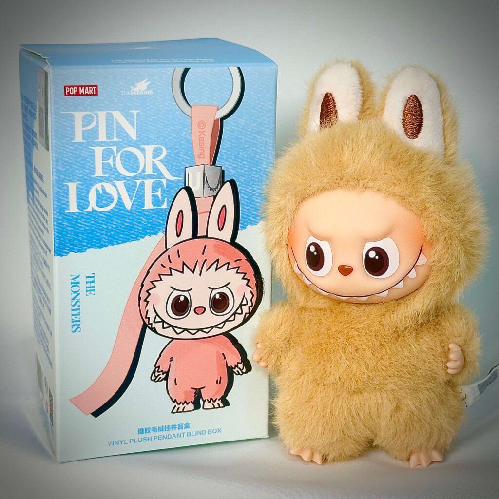 mini labubu pin for love s beside box