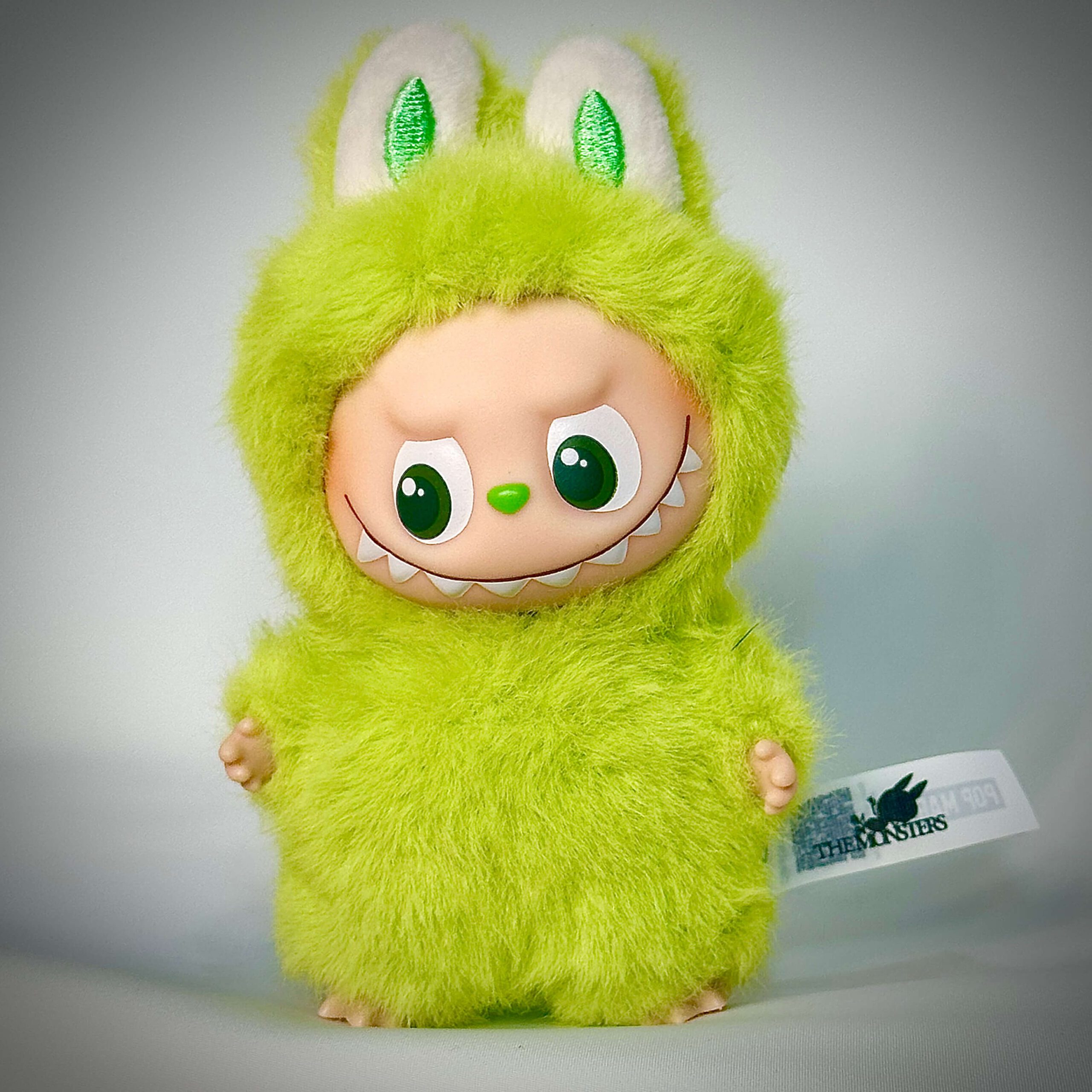 mini labubu pin for love v white background