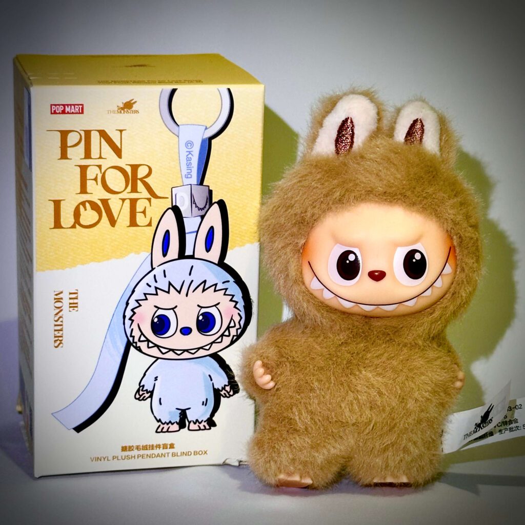 mini labubu pin for love v4 b belief beside box