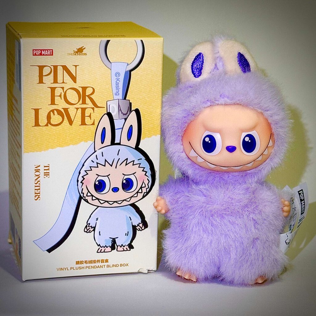mini labubu pin for love v4 e equality beside box