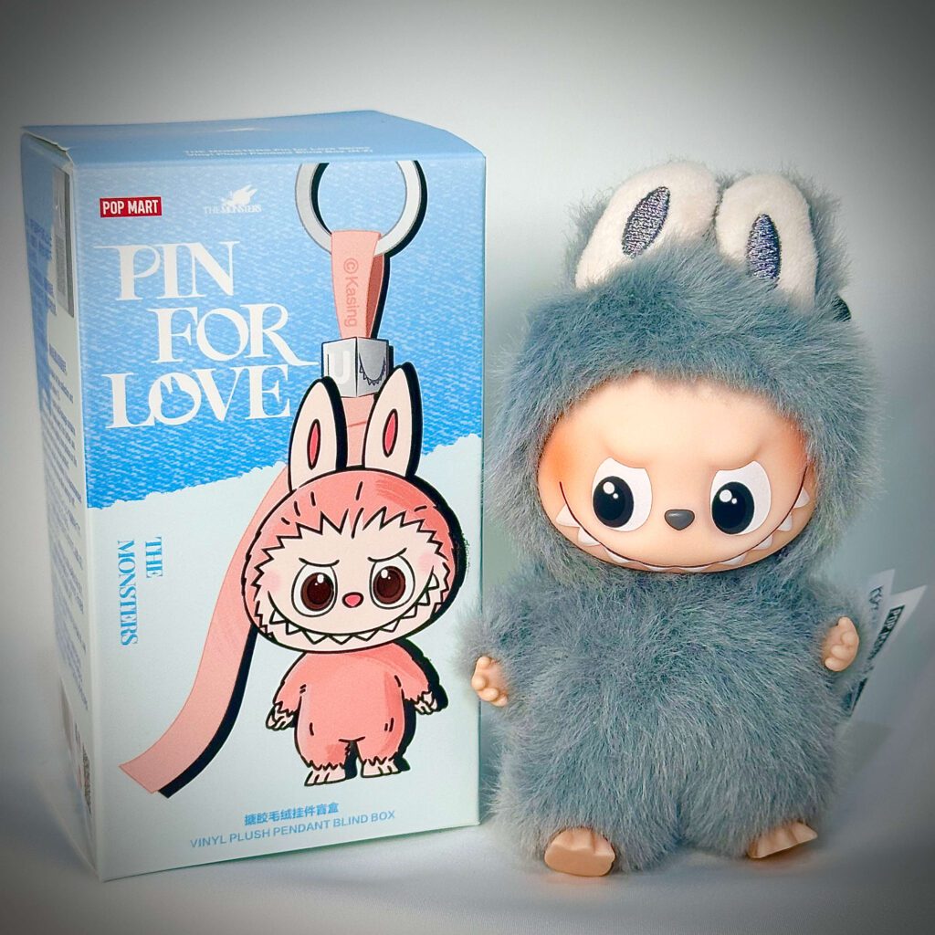 mini labubu pin for love w beside box